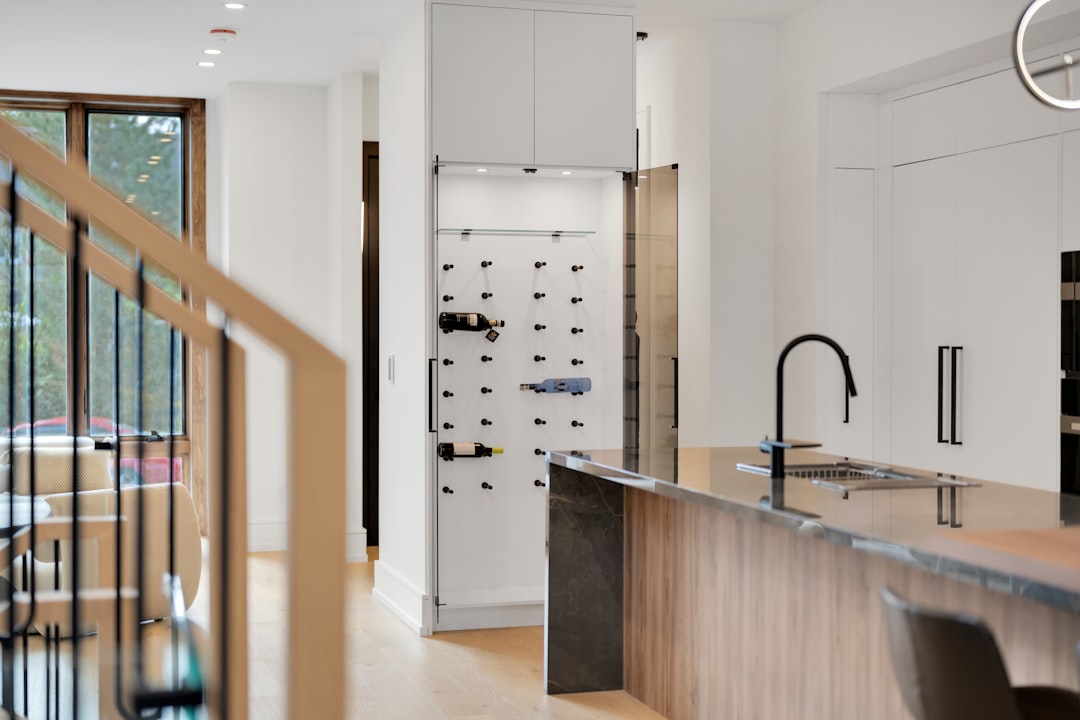 modern-kitchen-with-wine-rack-and-island-aju-lo3npa
