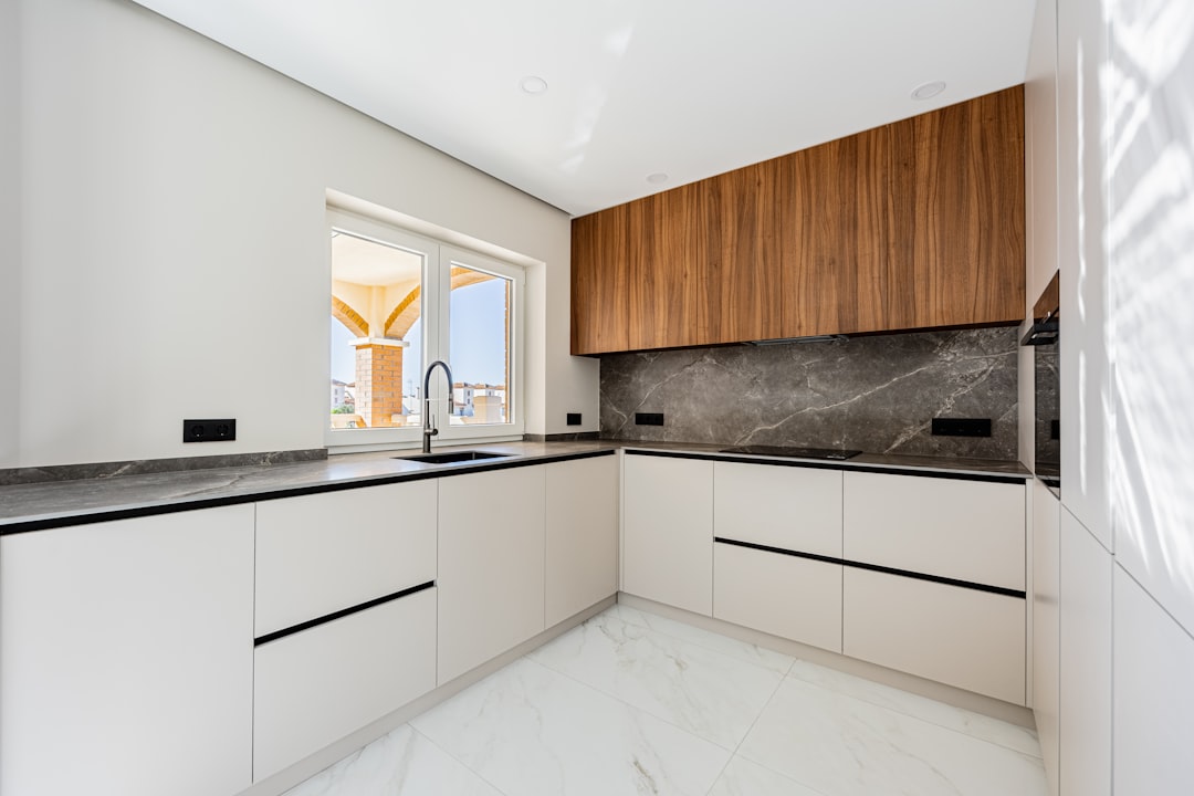 Contemporary kitchen with wood and stone combination