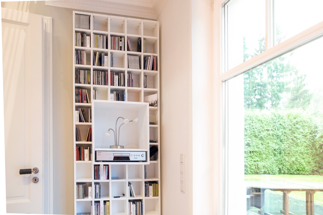 CD shelf with individual compartments made of MDF