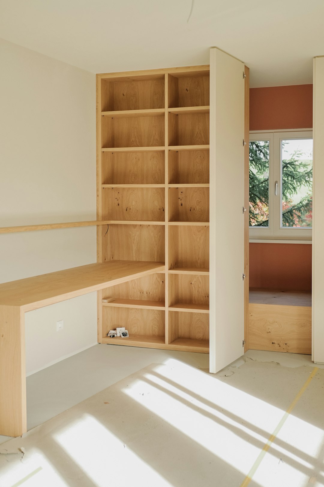 wooden-bookshelf-with-integrated-desk-and-window-view-fiqxgerz-qm
